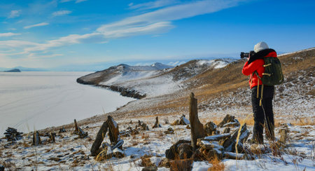 Traveler girl with a photo shoot amazing landscape on top of mountain.