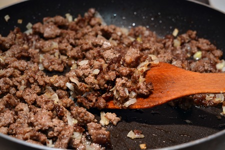 Process of frying minced meat with oniion.の写真素材
