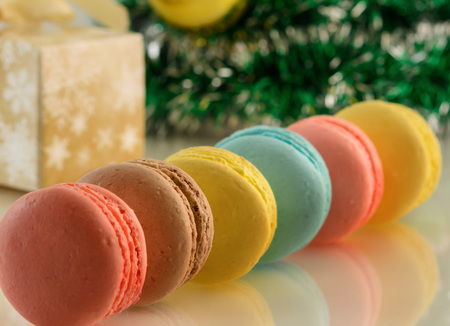 Tasty macaroos and cristmas treeの写真素材
