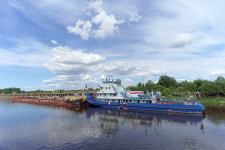 Gorodets,, Russia - June 22016 Tug River near Gateway Gorodetskyのeditorial素材