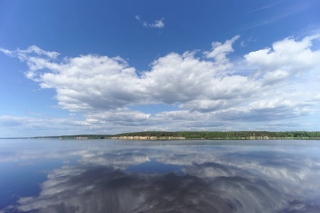 River view with clouds reflected in it, Volga, Russiaの写真素材