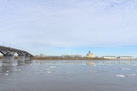 Nizhny Novgorod, Russia. Oka's watery expanse. In the distance one can see the Cathedral of Alexander Nevsky and the construction of a football stadiumの写真素材