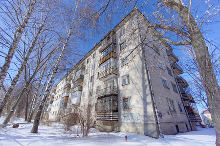 Nizhny Novgorod, Russia. - March 29.2018. Residential multi-storey house with unusual balconies lined with wooden boards with gaps on Malaya Yamskaya street 7B.のeditorial素材