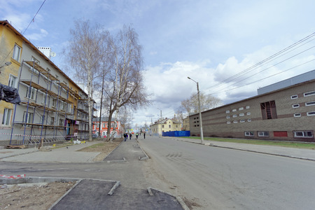 Nizhny Novgorod, Russia. - April 27.2018. Hasty repairs and painting of the facades of buildings near the football stadium on Sovnarkomovskaya Street.のeditorial素材