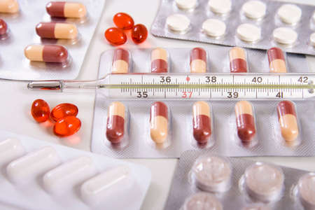 pills and thermometer 36,6の写真素材