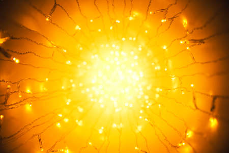 Lights Garland, Abstract Blurred Led Light, Yellow Lighting Bokeh Perspective as Explosion Raysの写真素材