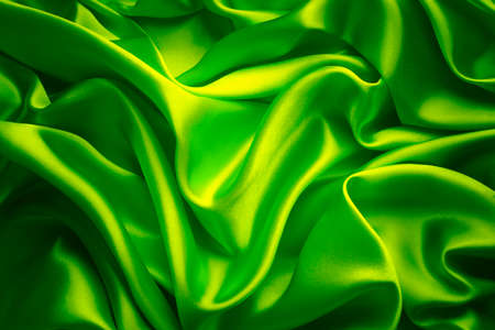 Silk Fabric Background, Green Satin Cloth Waves Textureの写真素材