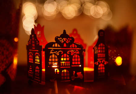 Home Decoration in Candle Light, Christmas Abstract Lighting House Decor over De Focused Lighting Backgroundの写真素材