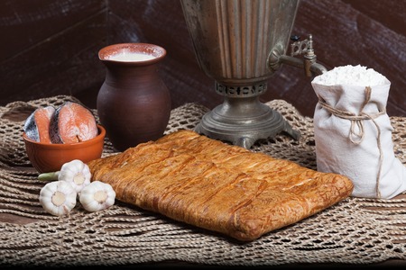 Pie on the table with food setの写真素材