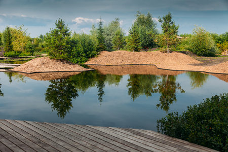 place for chillout outdoor on lake with pierの写真素材