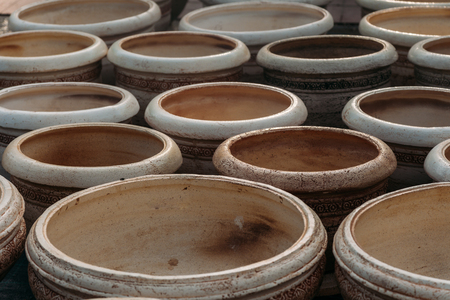 a lot of empty pots on groundの写真素材