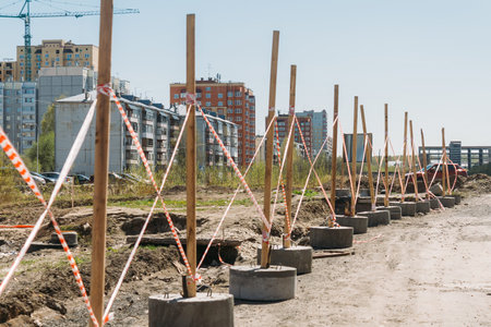 the fence around the construction site in the mud