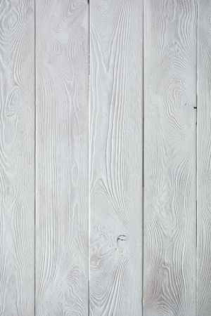 Textured pine boards covered with gray paint are arranged vertically. background conceptの写真素材