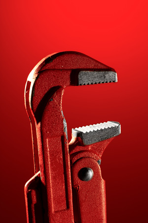Sanitary red key on a red backgroundの写真素材