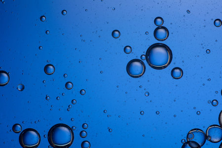 macro oil and water. concept of cola with ice