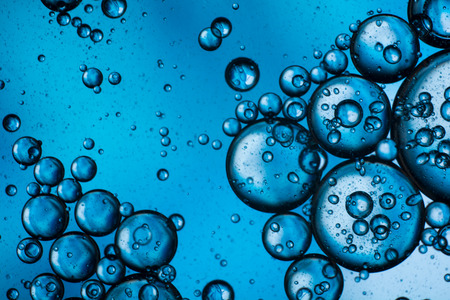 abstract blue background mixture of oil and waterの写真素材