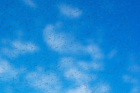 texture of cracked glass on sky backgroundの写真素材