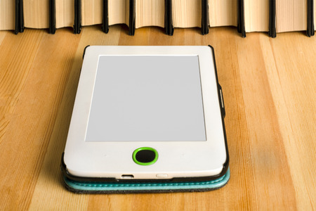 e-book on a wooden tableの写真素材