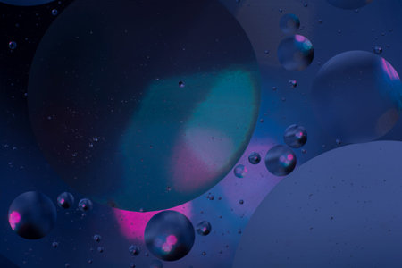 dark blue abstraction of oil balls on the water