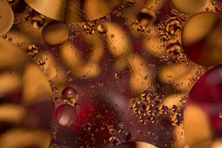 macro oil and water. concept of cola with iceの写真素材