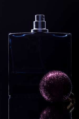 man's perfume on a black background. christmas gift conceptの写真素材
