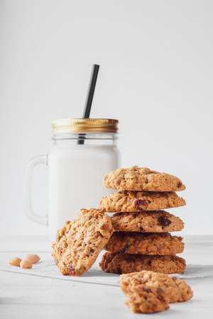 oatmeal cookies with milk on a light backgroundの写真素材