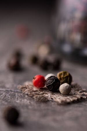 mix of peppers on jute fabric close-upの写真素材