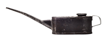 Old oiler on a white isolated background close-up. Shabby oiler.