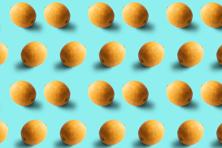Dried lemon pattern on a blue background. Food texture. Seamless texture of lemon.