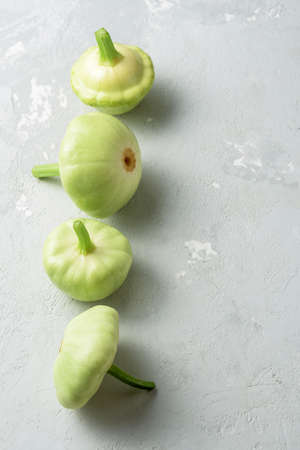 Fresh patissons on a concrete background.の写真素材