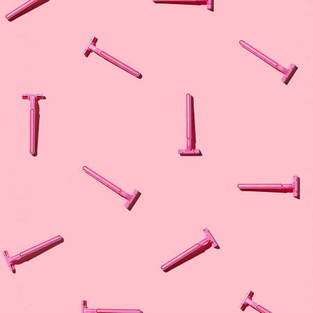 Seamless pattern of pink female razors on a pink background.の写真素材