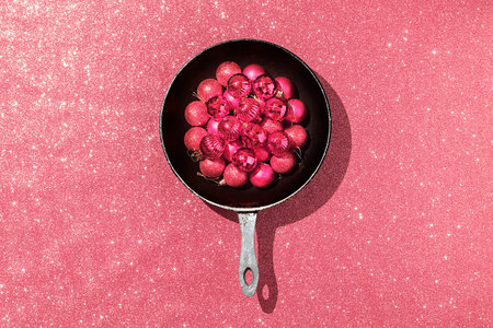 Red Christmas balls in a pan