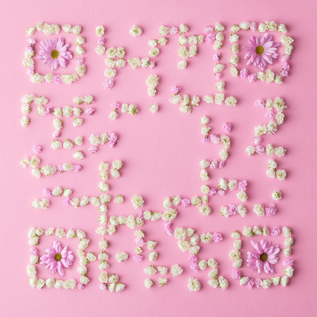Floral spring composition in the form of qr code. Creative floral layout on a pink background.