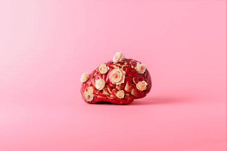 Human brain with roses on a pink background. 3d rendering.の写真素材