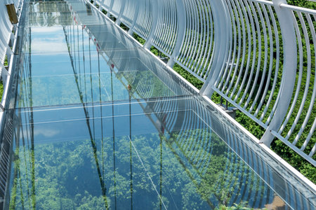 Suspended glass bridge over a cliff. extreme tourism.の写真素材