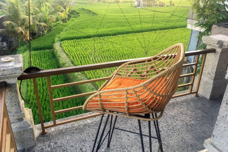 Orange high chair on the background of the rice terraces against the background of sunset or dawn. Recreational concept.の写真素材
