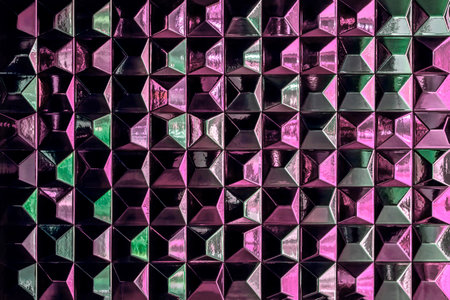 Pink and green abstract texture with geometric pattern made of glossy tiles, featuring striking reflections and depthの写真素材