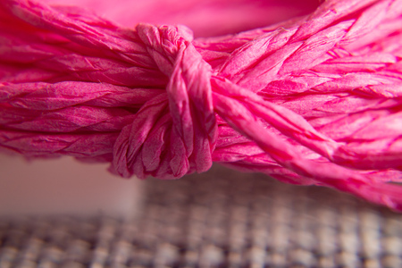 background texture of pink rope with knot. concept and design. macrophotography.の写真素材