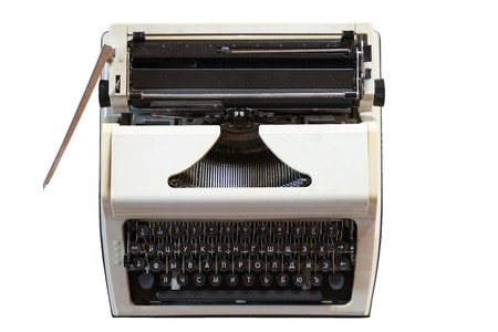 Old typewriter on white isolated background. retro style and Antiques. subject photographyの写真素材