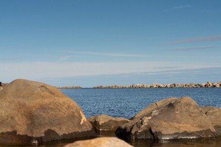 Stone Harbor in the Baltic sea, calm sea, stone shore. seascapeの写真素材