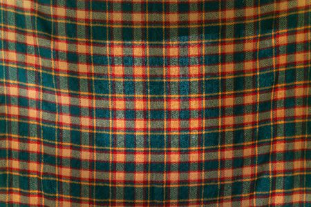abstract background texture of green fabric with yellow square pattern.の写真素材