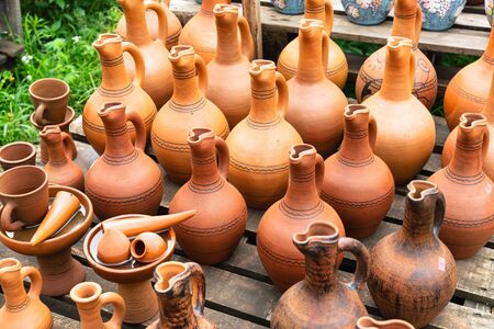 beautiful jars are made of clay. ceramics and handwork close-up. template for website or bannerの写真素材