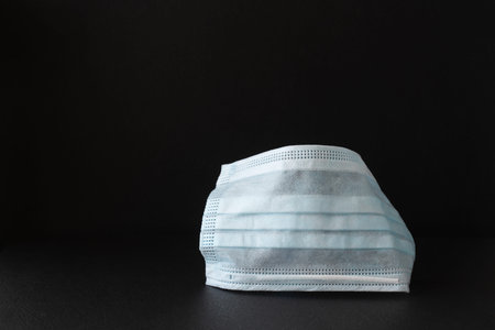 medical protective bandage for fighting the virus on a black background close-up