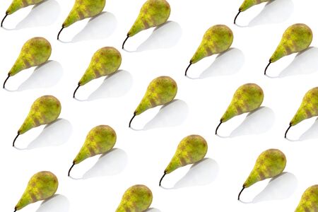 pattern fresh green pear on an isolated white background with reflectionの写真素材