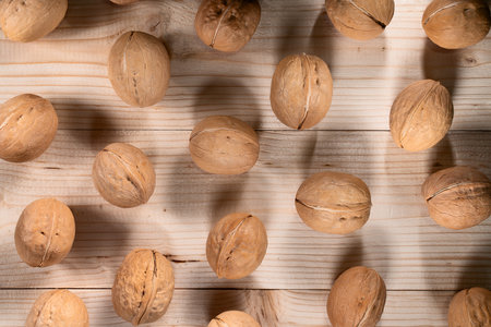 beautiful background. walnuts on a wooden table top view.