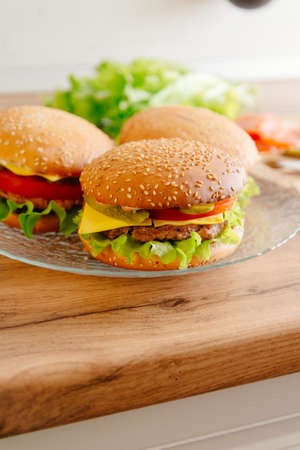Homemade burgers. Burgers cooked at home kitchen.の写真素材