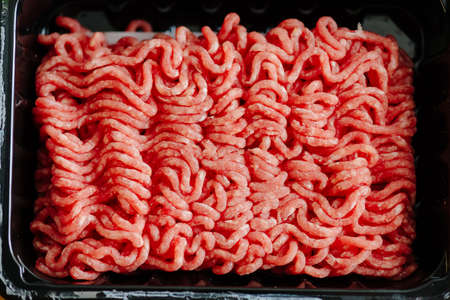 Ground beef in a plastic tray.の写真素材