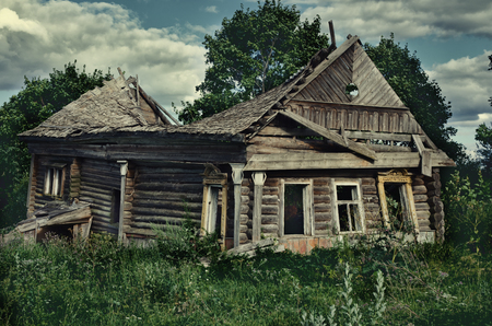 An old dilapidated wooden house. Shot in the Yaroslavl region, Russia.の写真素材