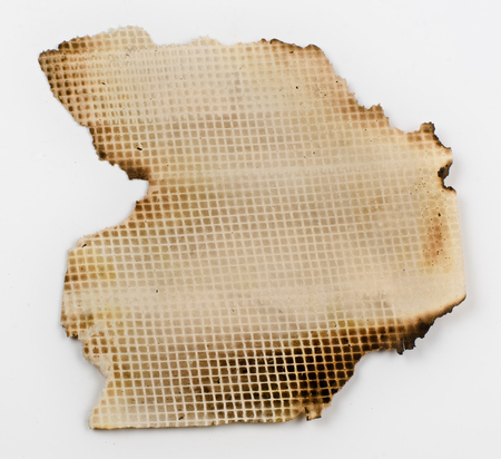 old, burnt on the edges of the sheet of paper. Like an old parchment, on which the pirates drew a treasure map.の写真素材