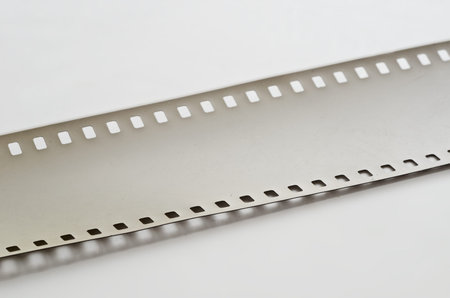 illuminated with perforation of the photographic film on a light surface